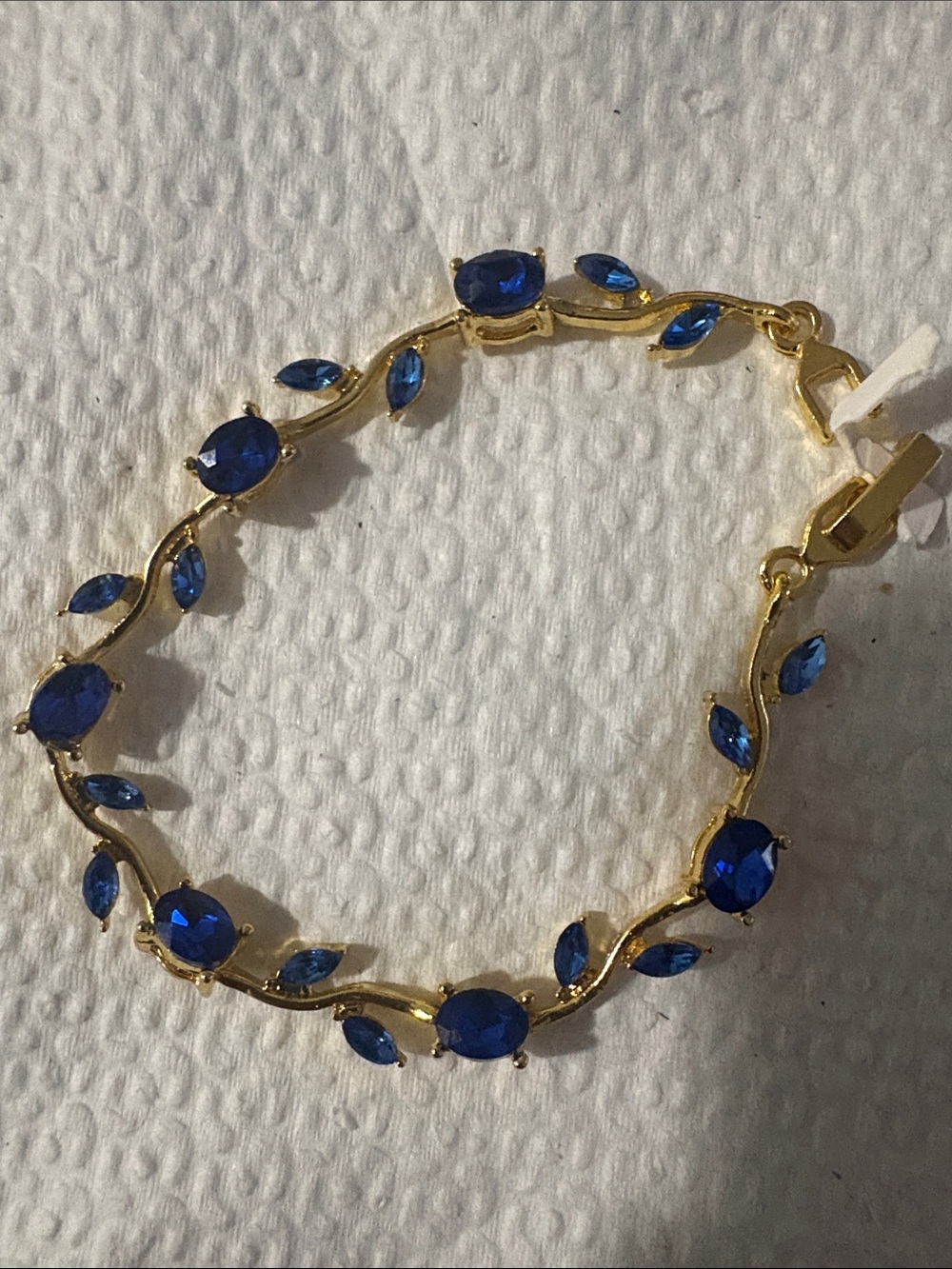 Gold-Tone Bracelet with Deep Blue Crystal Accents